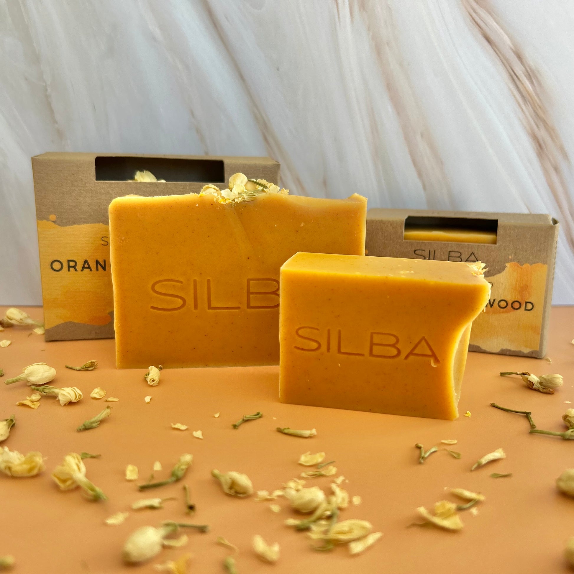 Orange Cedarwood displayed in soap box and half size without soap box