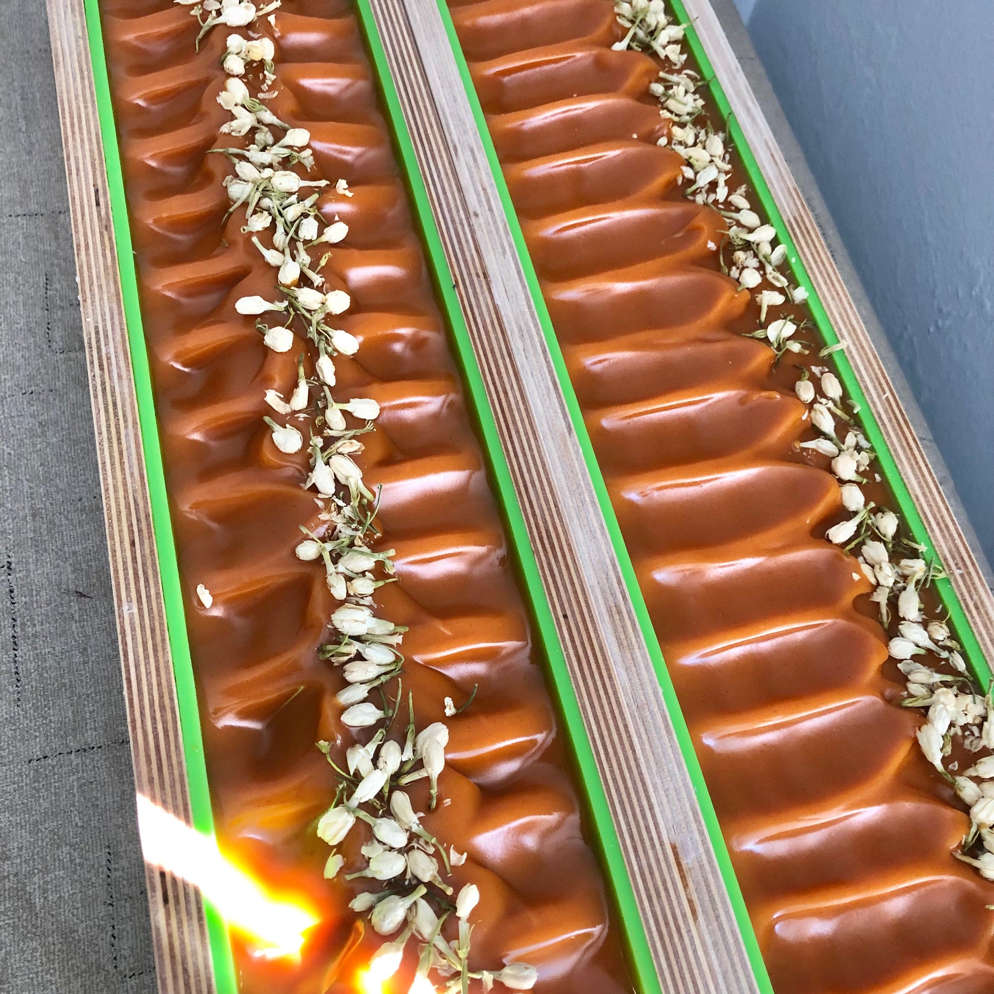 Orange Cedarwood Turmeric Soap poured into mold