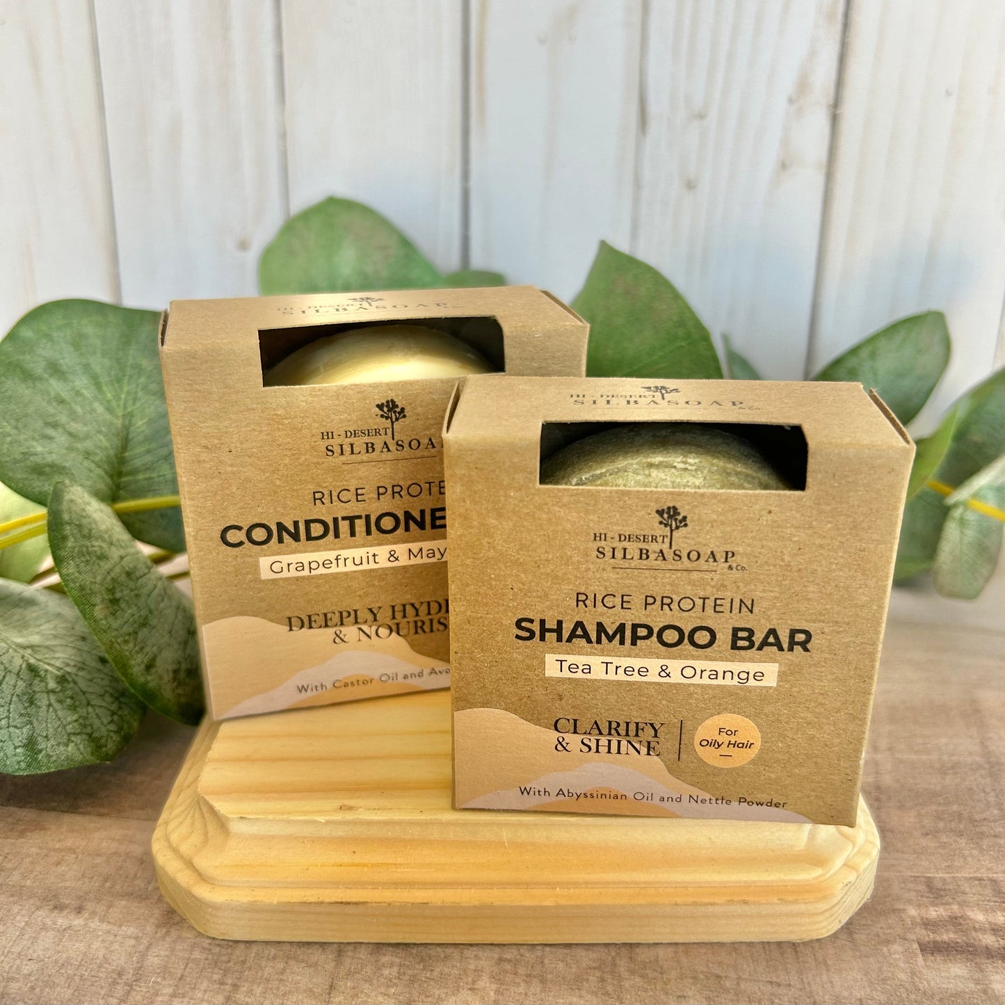 Shampoo Bar for normal hair & Conditioner Bar  displayed on wooden board